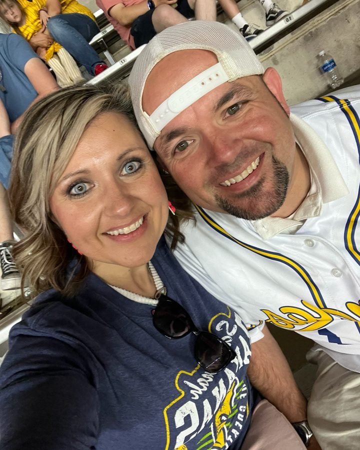 Jerry and his wife at a baseball game